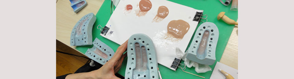 A scene where prosthetic limbs are being made
