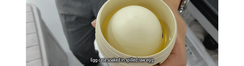 Egg case soaked in spilled raw egg